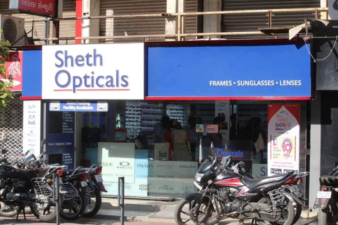 Sheth Opticals,  Uttarayan, Sheth, Sunglasses, Uttarayan, Rayban,, Maui, Jim,, Vogue,, Cazal,, Bvlgari,, Versace,, Burberry,, DolceAndGabanna,, MichaelKors,, Prada,, EmporioArmani,, Coach,, Idee,, Image, Sheth_Opticals, Prahladnagar, Swastik_Crossroads, Uttarayan_Essentials:, Music,, Sunscreen, Mamra_Na_Laddu