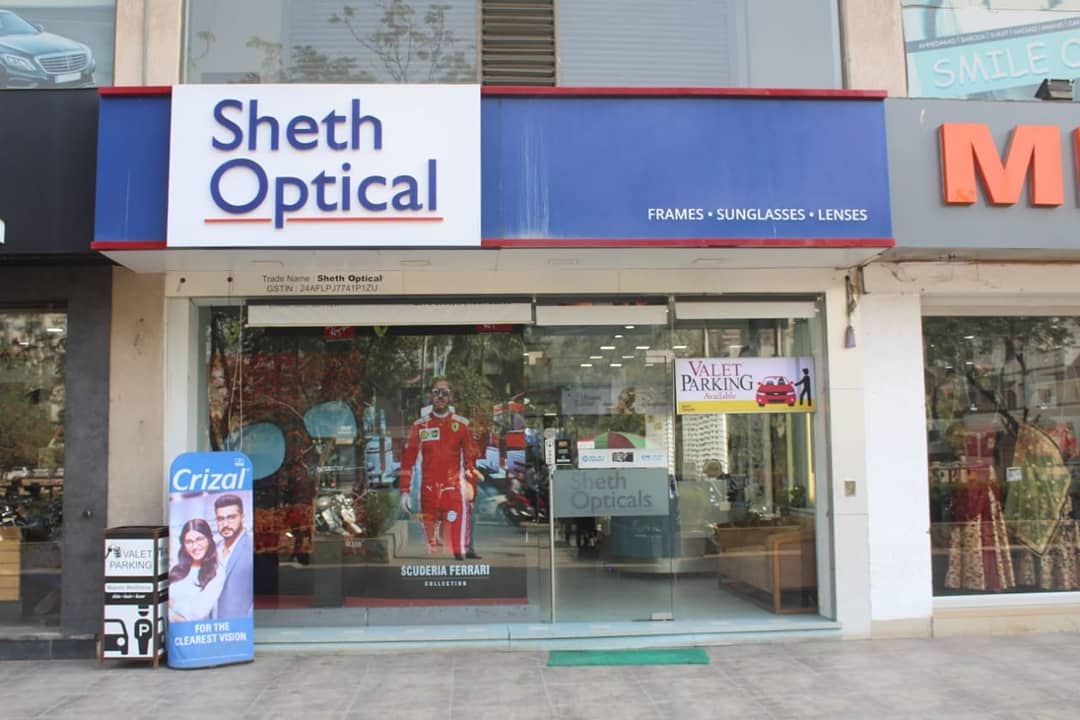 Sheth Opticals,  Uttarayan, Sheth, Sunglasses, Uttarayan, Rayban,, Maui, Jim,, Vogue,, Cazal,, Bvlgari,, Versace,, Burberry,, DolceAndGabanna,, MichaelKors,, Prada,, EmporioArmani,, Coach,, Idee,, Image, Sheth_Opticals, Prahladnagar, Swastik_Crossroads, Uttarayan_Essentials:, Music,, Sunscreen, Mamra_Na_Laddu