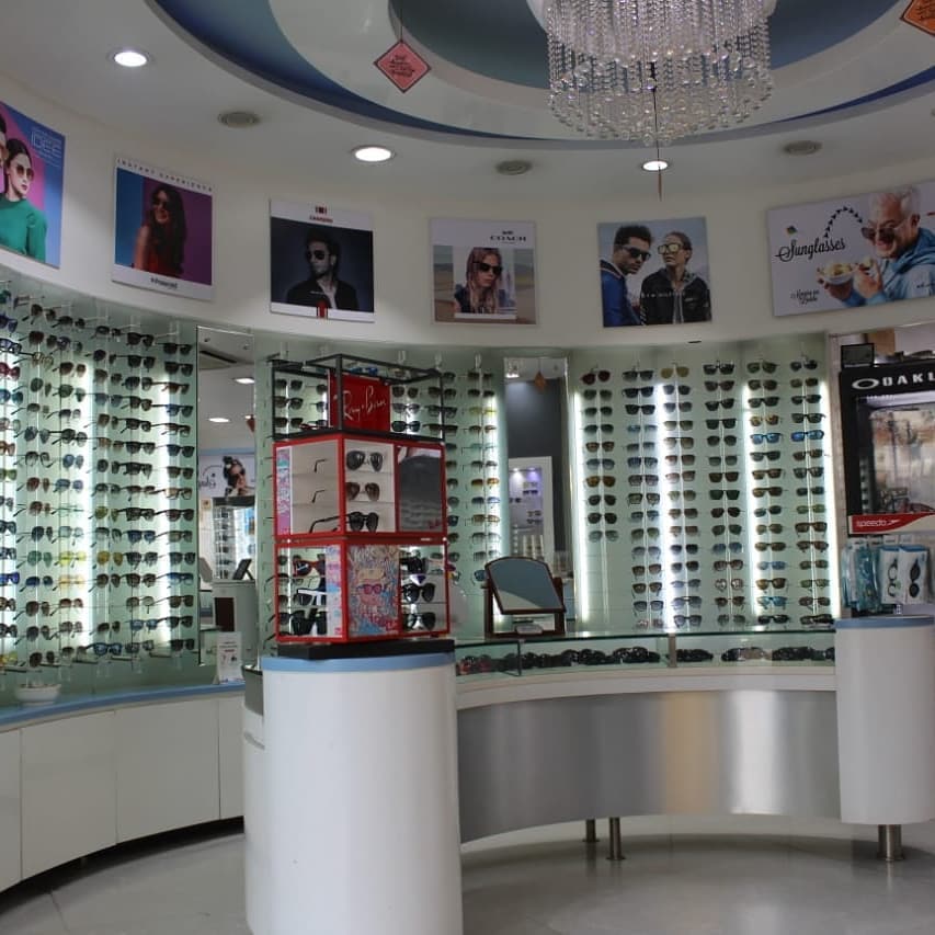 Sheth Opticals,  Uttarayan, Sunglasses, Uttarayan, Rayban,, Maui, Jim,, Vogue,, Cazal,, Bvlgari,, Versace,, Burberry,, DolceAndGabanna,, MichaelKors,, Prada,, EmporioArmani,, Coach,, Idee,, Image, Sheth_Opticals, Prahladnagar, Swastik_Crossroads, Uttarayan_Essentials:, Music,, Sunscreen, Mamra_Na_Laddu